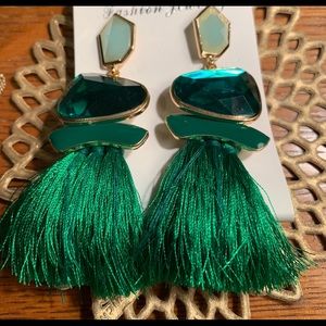 Emerald green crystal and fringe drop earrings.